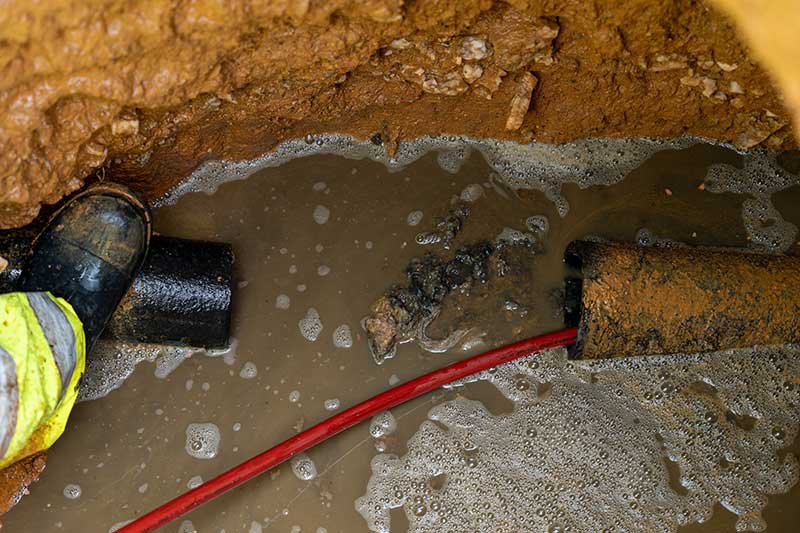 sewer camera inspection sewer camera inspection: A broken sewer line that is being cleaned with a hydro jet. A clogged up main sewer line that has been cut to be able to clean the clog.