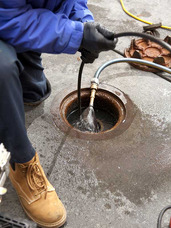 sewer inspection near me sewer line inspection sewer inspection near me sewer line inspection - Commercial plumbers check a pipe using a camera after hydro line jetting the pipe at a large restaurant.