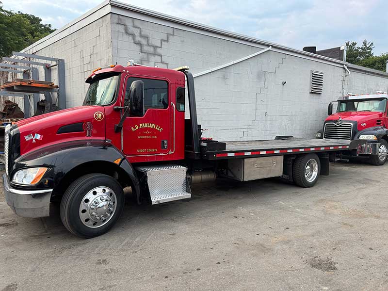 ramp truck service and low bed heavy equipment removal truck